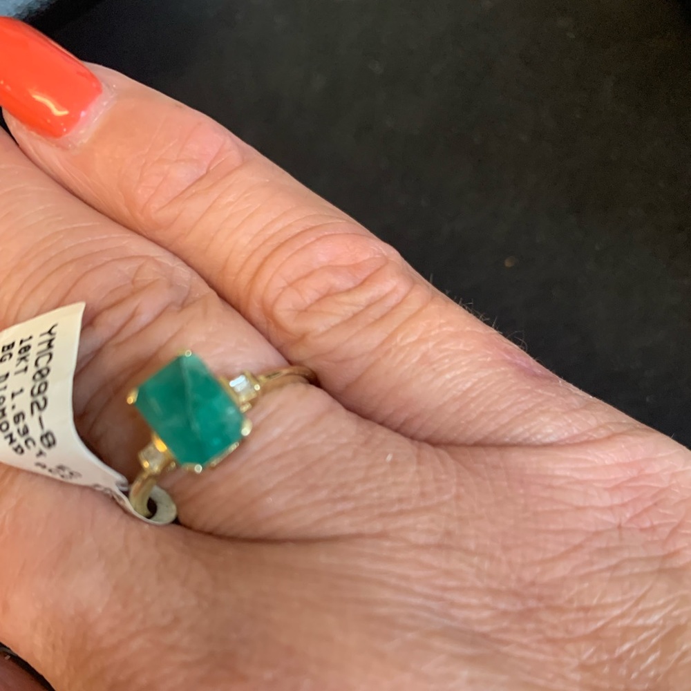 genuine 10k gold Emerald and diamond ring. Size 8.
